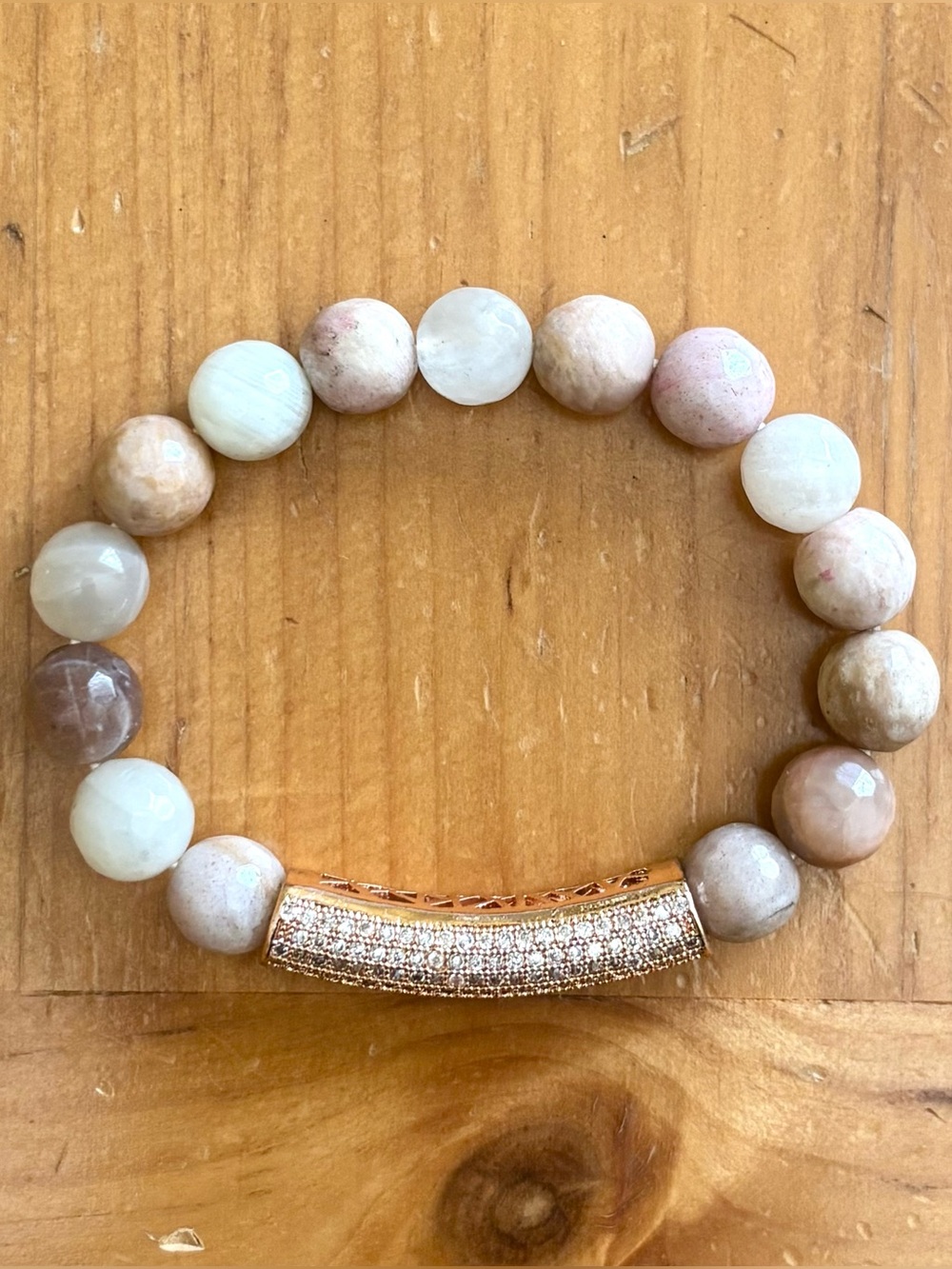 Faceted pink agate bead bracelet with sparkly gold-tone bar
